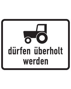 Zusatzzeichen 1049-11 mit Traktor-Sinnbild und Aufschrift „dürfen überholt werden“